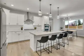 Seller enlarged the island for more comfortable seating and upgraded sink.