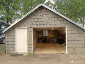 THE HOME ALSO HAS A ONE CAR GARAGE WITH WORK SHOP!  ON THE LEFT SIDE OF THE GARAGE IS 50 AMP ELECTRICAL FOR RV SERVICE!