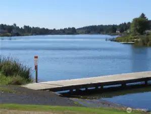 AND JUST AROUND THE CORNER FROM THE HOME IS NORTH BAY PARK WHERE YOU CAN FISH FOR 8 POUND TROUT OR LAUNCH A BOAT TO ACCESS 23 MILES OF FRESH WATERWAYS!