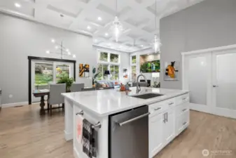 The kitchen is in the hub of the house, and the office is right next to it. The dining and living rooms are open to the kitchen and office.