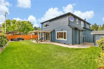 To the right, an 8x8 ft storage shed provides additional space for tools, equipment, and seasonal storage. The Rainbird seven-zone sprinkler system—complete with a Rachio smart controller—ensures the entire front and backyard stays lush and green all year round with effortless watering.