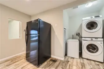 Laundry Area with curtain removed. Freezer and Fridge Stay