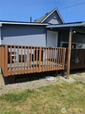 back deck, great for BBQ season! partially covered