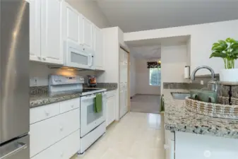 Beautiful granite counters in this updated kitchen