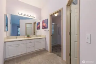 Primary bath includes dual sinks, walk-in closet