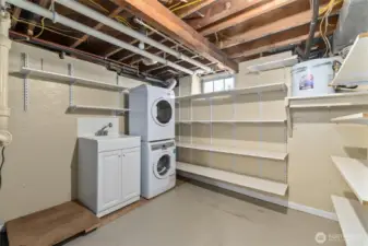 Utility and storage room with brand new furnace and dedicated hotwater tank for ensuite. Primary On Demand system is located outside.