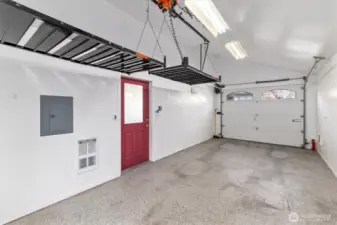 Automated storage lifts in the garage to maximize space.