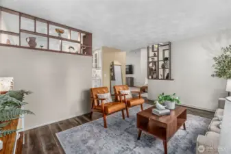 Looking throught the living room with dining & kitchen to the left .