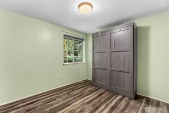 Bedroom #2 with built-in Murphy bed for incredible versatility! A guest room when you need it OR a wonderful home office or den when you don't.