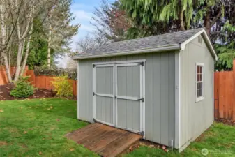 There are 2 sizable garden sheds for storing everything you need to keep the yard neat & beautiful. Notice the ramp for easy access of mower, pressure washer etc.