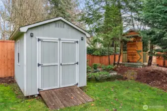 The 8'x10' shed & adorable potting shed/playhouse to the right...