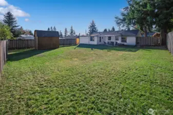 Enjoy an oversized, level lot—perfect for pets, gardening, or play.