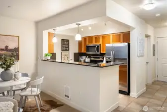 Entertaining was never easier!  This layout in the kitchen has tile floors.