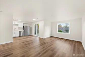 Living Area, New Sliding Glass Door Accesses Private Balcony!