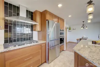 Gas stove with hood vent