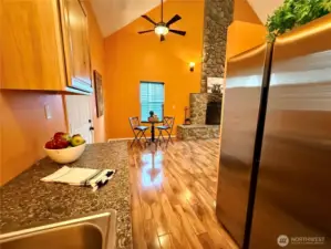 Another view of the kitchen, with a view of the dining area.