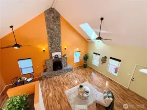 A view of the great room from the upstairs loft primary bedroom.