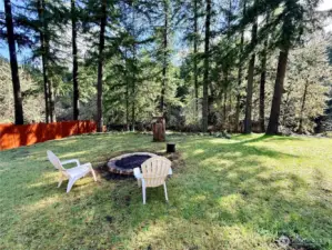 Down in the backyard, a big fire-pit to enjoy the great outdoors, and enjoy your view of the serene pond.