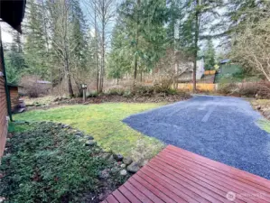 A view of the front yard, and parking.