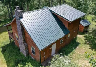 (2023) Aeriel photo of the front of the home.