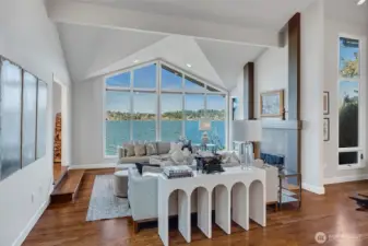 Hardwood floors and a cozy fireplace add warmth