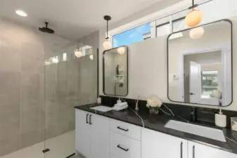 Natural light also is a part of this bathroom. The curated design of the opening on top of the bathroom allows a pleasurable showering experience