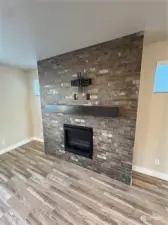 Gas fireplace with tv mount and behind the wall smurf tube and electrical