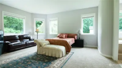 Master Bedroom on Main Level with built-in TV Stereo organizer cupboard across from the bed