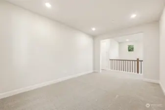 Loft looking out across hall at vaulted ceiling