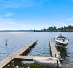 A newly constructed boat dock (2019) with two hydraulic boat lifts awaits, capable of securely mooring yachts up to 65 feet in length.