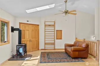 Bonus loft room offers flexibility for home office, studio, or fourth bedroom.