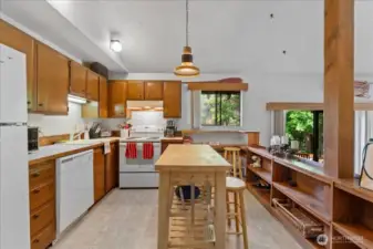 Generous kitchen that includes a movable island counter