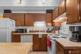 A wealth of kitchen cabinets offering ample storage