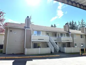 Ground floor corner unit with no steps and has fenced patio with storage.