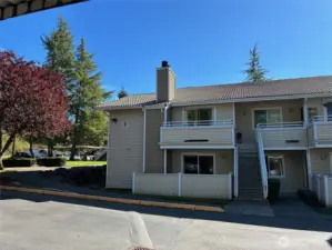 Ground floor corner unit with no steps and has fenced patio with storage.