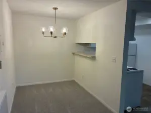 Spacious dining room with pass through to the kitchen.