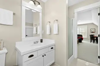 A convenient three-quarter bath serves the third-floor loft, making the space versatile and guest-ready.