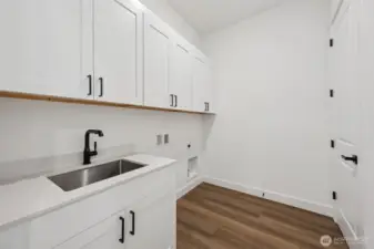 Utility Room*This photo is of another home. Features and finishes may vary.