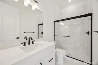 3/4 bath off 2nd Primary *This photo is of another home. Features and finishes may vary.