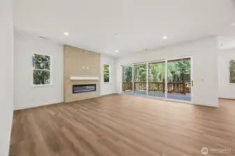Great Room with Multi Slide Doors to Patio *This photo is of another home. Features and finishes may vary.