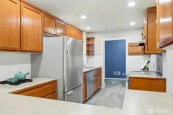 Generous layout with tons of storage makes this kitchen a true standout.  [Virtually staged photo]