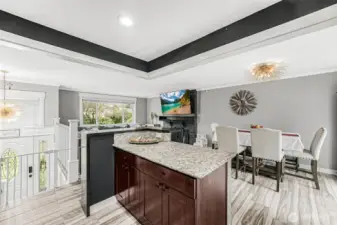 The owners took down a couple sections of kitchen walls to open up this kitchen and added this convenient eating bar. Nicely done!