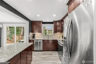 Kitchen access to deck is very convenient for those summer party events.