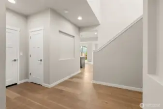 Dramatic entryway with vaulted ceilings