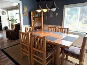 The charm continues into the spacious dining room, furniture included.