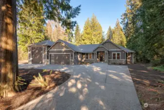 Circular driveway nestled in the trees