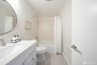 Remodeled full bath.