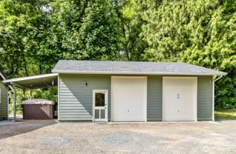 24'x36' heated and insulated shop.  A 8'x16' swim spa is under the carport.