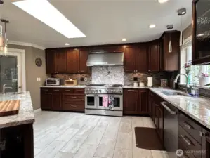 The heart of this amazing home is the chef's kitchen... You can have allot of people in this huge kitchen and still actually cook! Such an inviting space for all to gather and make memories.