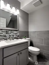 Lower level 1/2 bath and laundry.